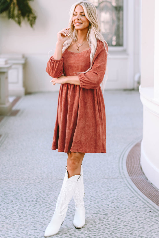 Brown suede dress with square neck and puffed sleeves