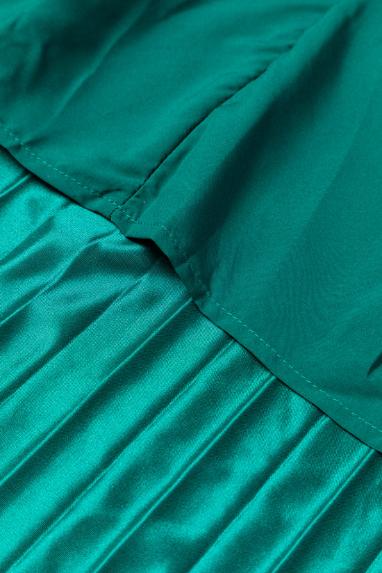 Jupe longue plissée en satin vert noirâtre à taille élastique