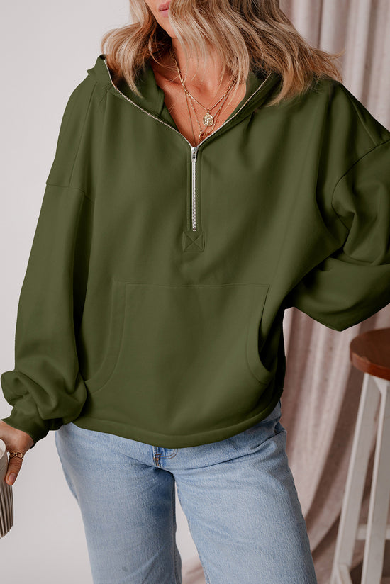 Loose-fitting half-zip hoodie with fleece-lined kangaroo pockets in moss green