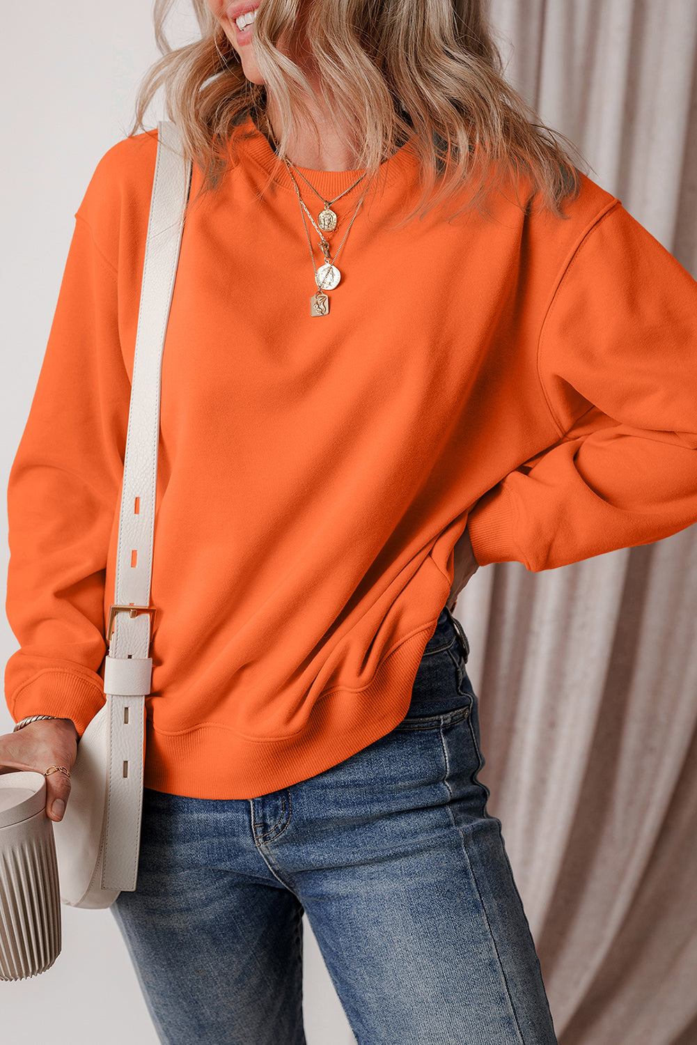 Sweat-shirt en tissu éponge à épaules tombantes et doublure en polaire uni orange roux