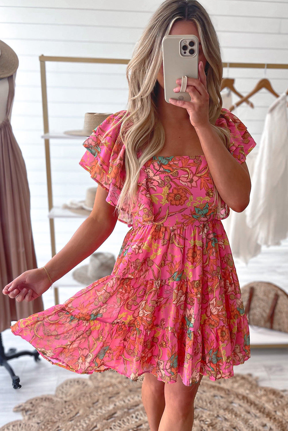 Pink floral dress with square neck and ruffled sleeves