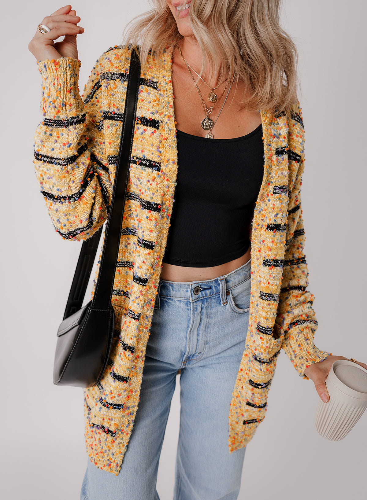 Cardigan long beige rayé en tricot à pompons ouvert sur le devant-A WOMAN WE LOVE