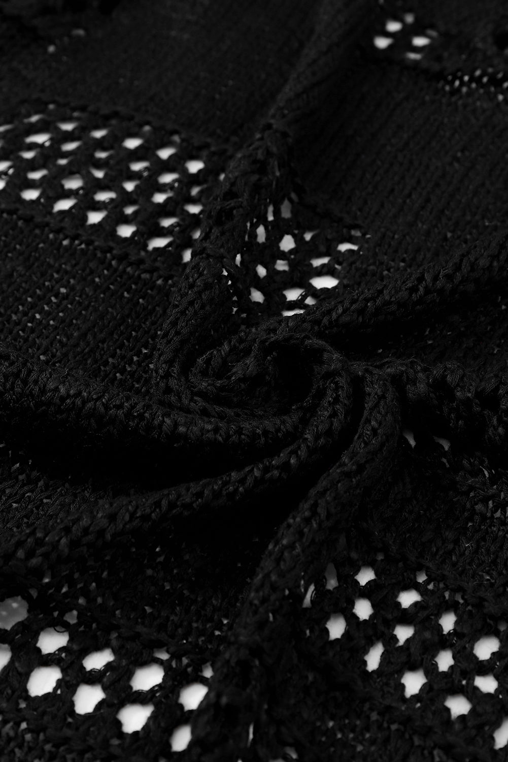 Cárdigan de manga Dolman de punto de punto hueco negro de color negro