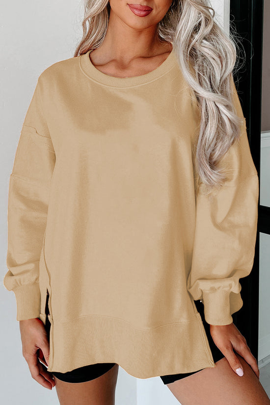 Light French beige beige sweatshirt, drooping shoulders, round neck and slits