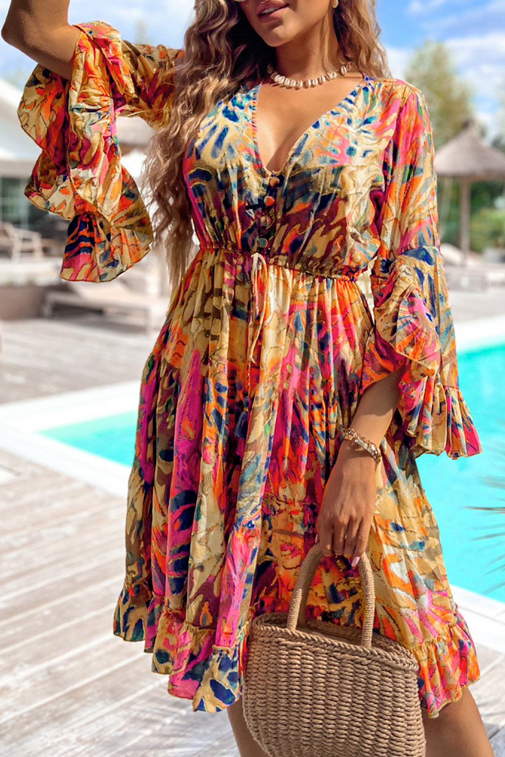 Pink fluid dress with flared sleeves *