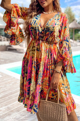 Pink fluid dress with flared sleeves *