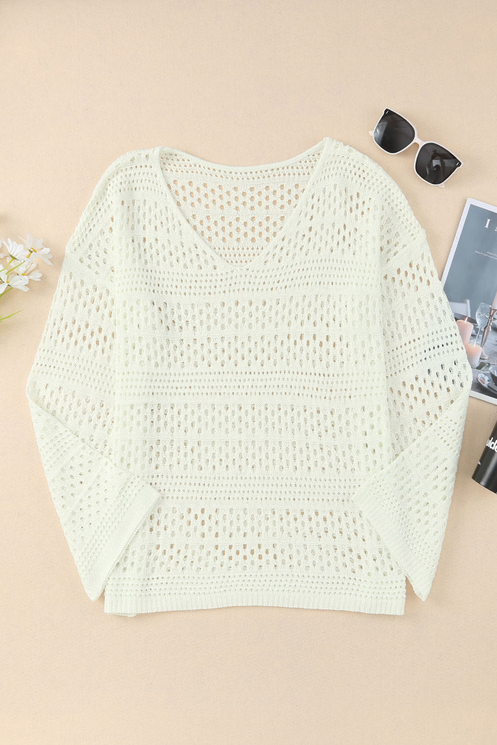 Pull blanc à col en V et crochet ajouré