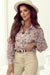 V -neck pink shirt and bishop sleeves with floral print