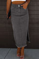 MIDI Skirt in black denim with raw edges and side slits