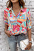 Multicolor a large shirt with half-underwenting sleeves and abstract geometric print