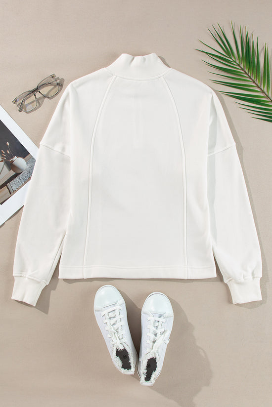 White zip-up sweatshirt with dropped shoulders