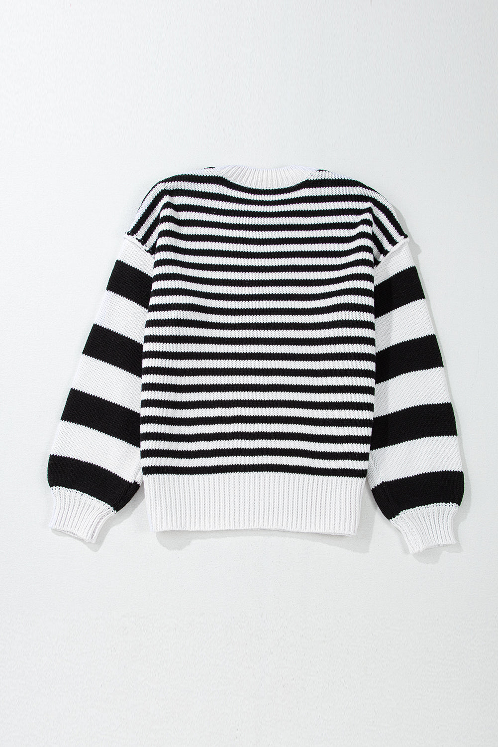 Black and white striped bishop sleeve drop shoulder knit sweater