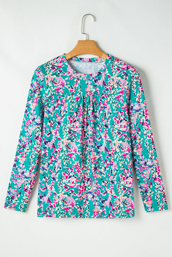 Ploted blouse with round -neck flowers and long green sleeves