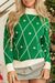 Pull à col haut à motif diamant vert foncé avec accents de pompons et bordure contrastée