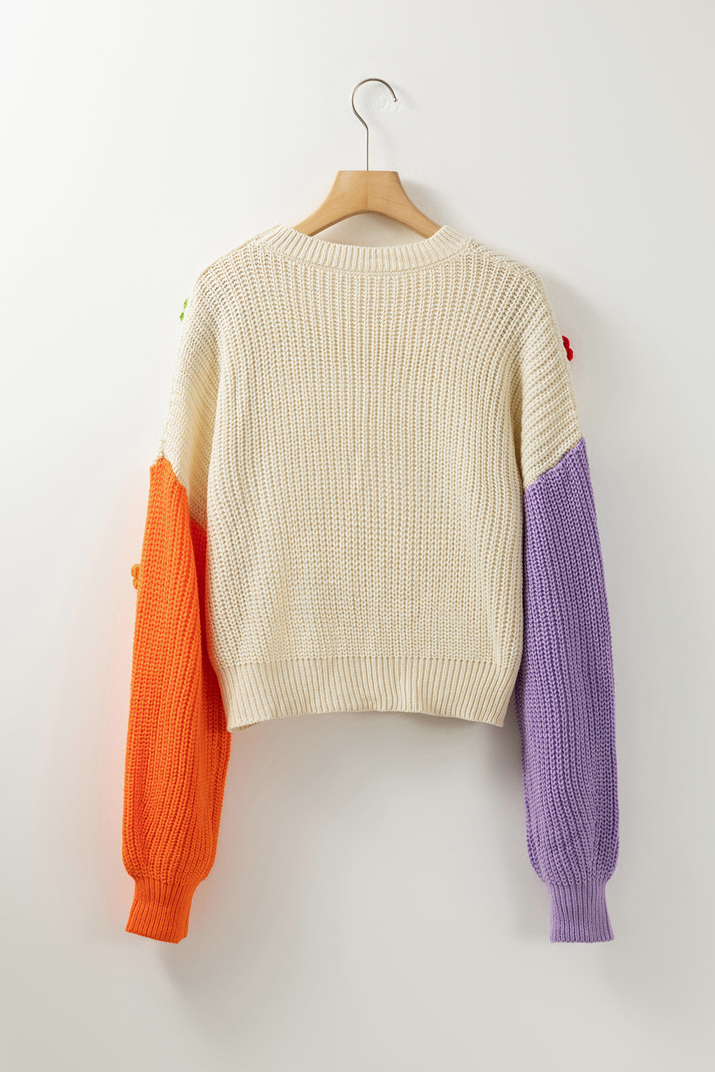 Mehrfarbige Blumenapplikationen Colorblock -Drop -Schulterpullover