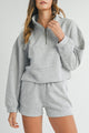 Ensemble sweat-shirt zippé et short gris clair à col montant