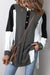 Black hoodie with button-down neckline and exposed stitching