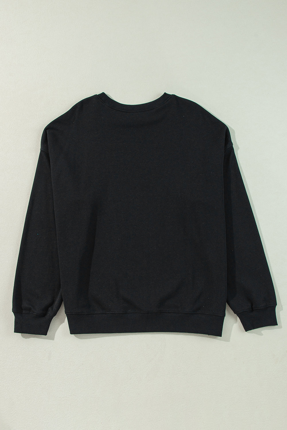 Sudadera negra unida con cuello y hombros caídos, gran tamaño