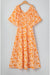 Robe longue smockée à imprimé floral orange*