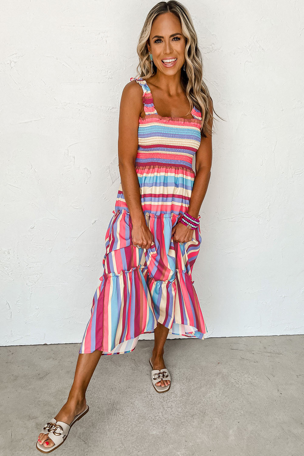 Long smocked dress with ruffles and red striped straps