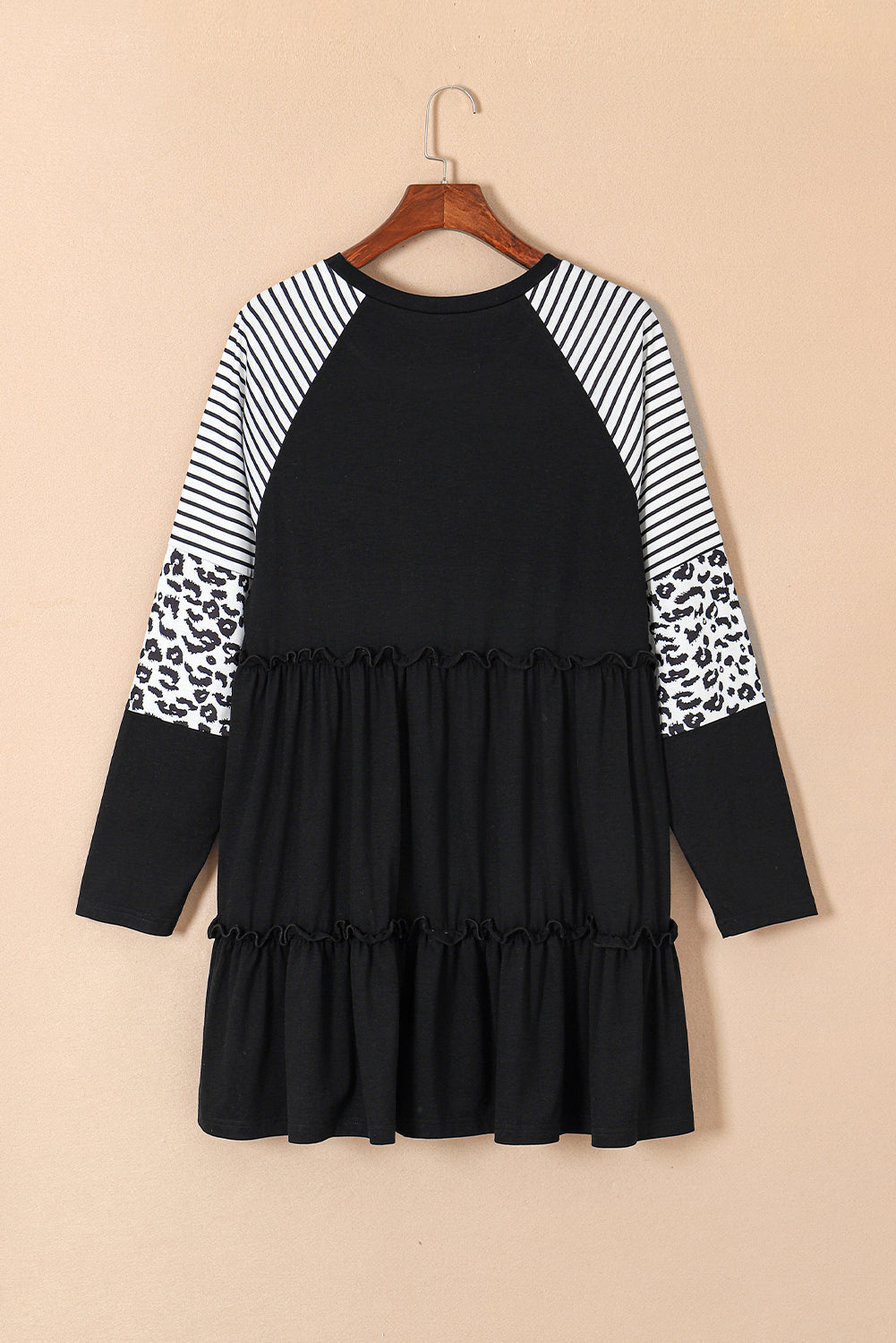 Striped black dress with ruffles and large leopard patch patch sleeves