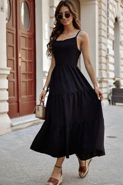 Long black crushed dress bare back with bodies on several levels