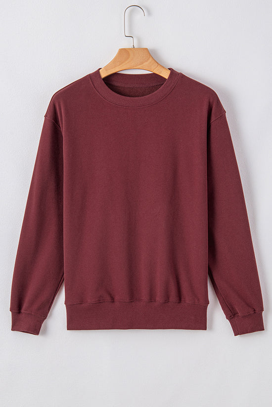 Solid burgundy sweatshirt with dropped shoulders and round neck