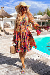Pink fluid dress with flared sleeves *