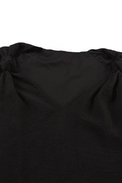 Chaleco negro con hombro anudado y v -neck