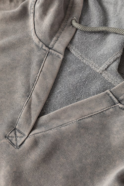 Grey mineral wash hoodie with exposed stitching