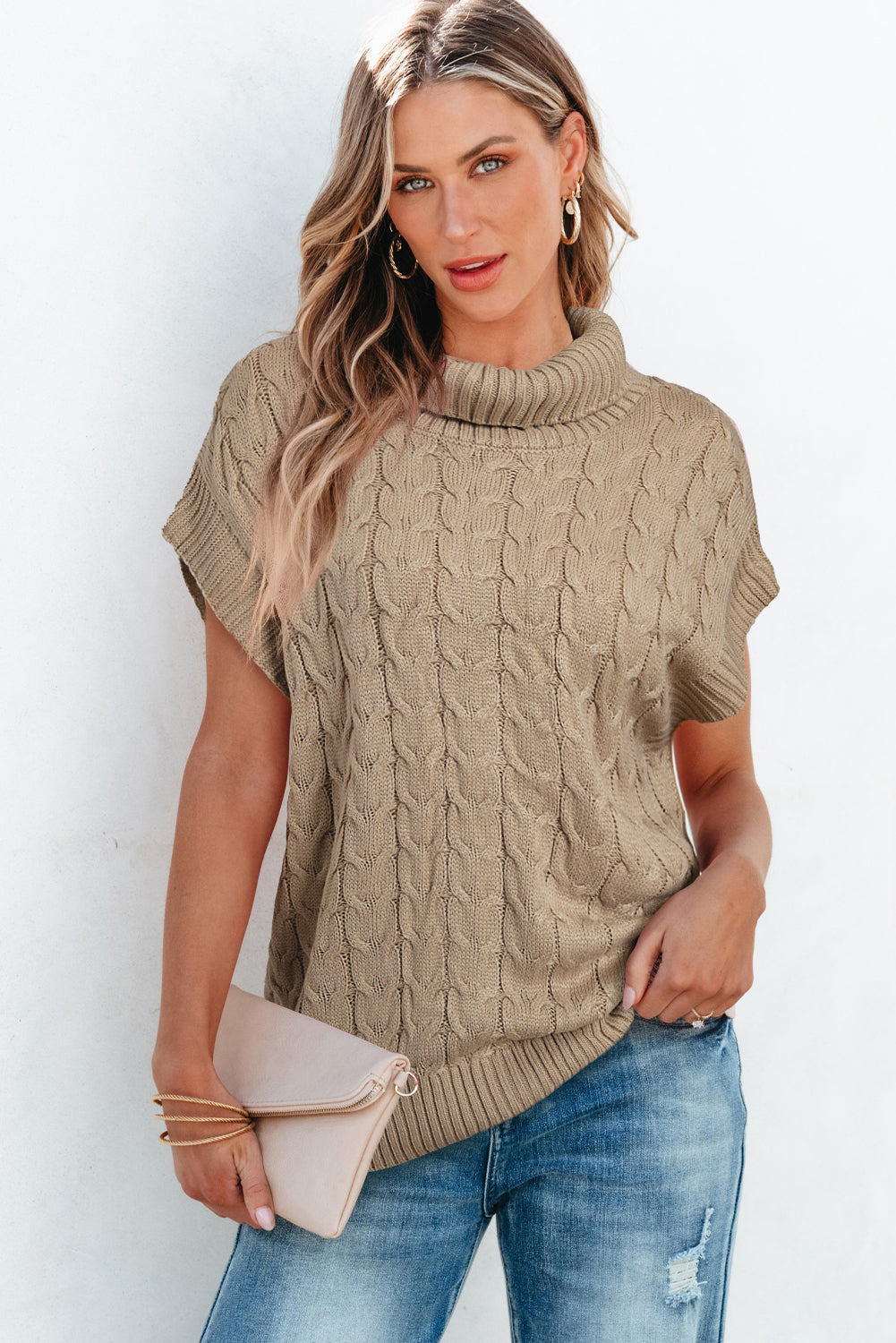 Rolled-collar sweater and bat handle in twisted French beige knitted