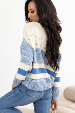 Light blue sweater with puffed sleeves and open stitch