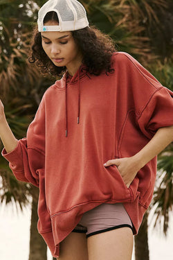 Ample hooded sweatshirt with tightening cord and drooping shoulder pockets Red Clay