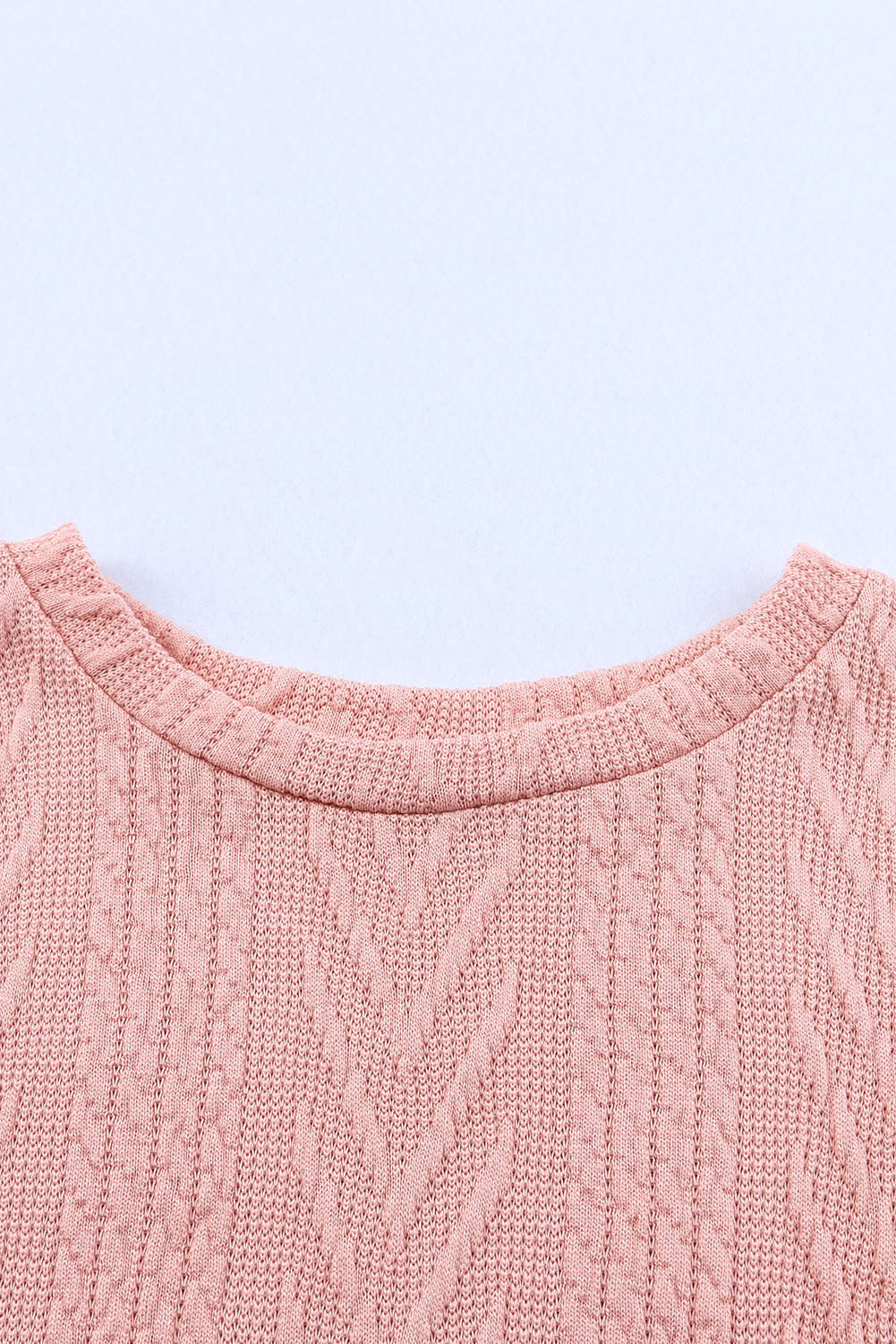 Haut en tricot texturé à manches épissées et paillettes léopard rose