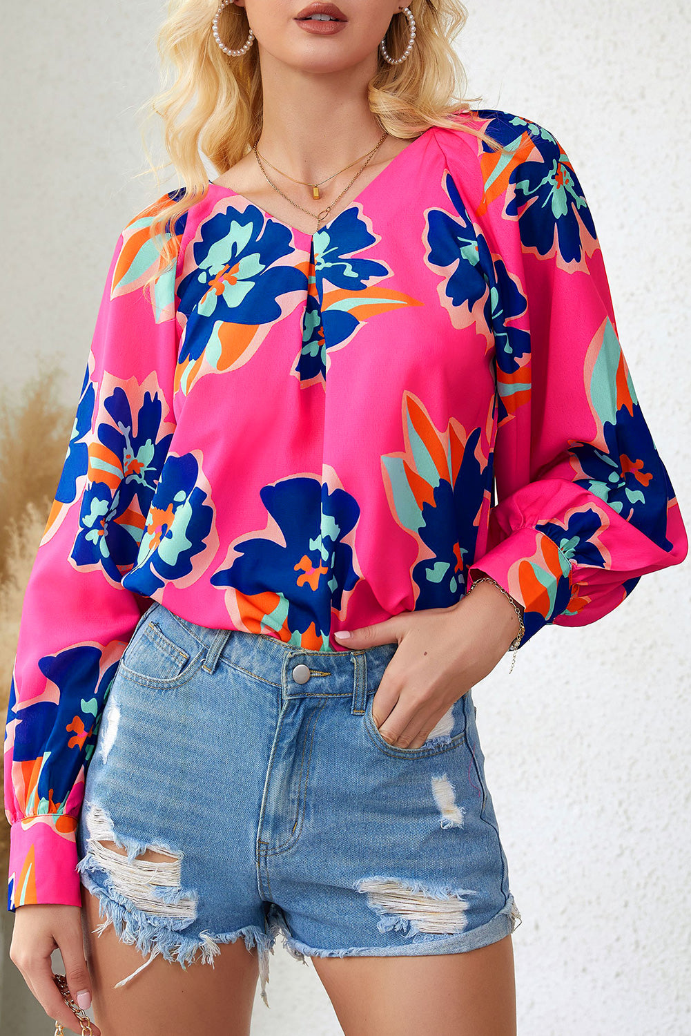 Blouse à manches bouffantes et imprimé fleurs roses