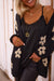 Black knitted cardigan with floral print *