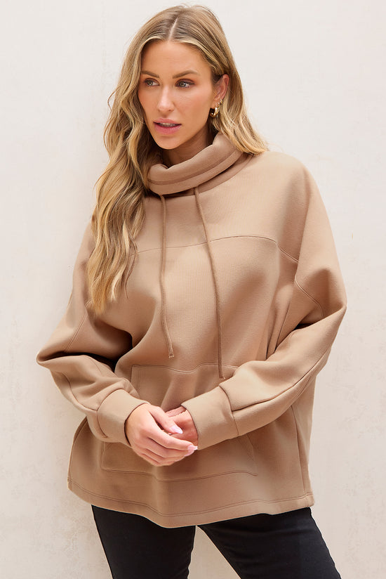 Light beige turtleneck sweatshirt with dolman sleeves and drawstring