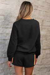 Sweater relajado de dos piezas y pantalones cortos a rayas negras