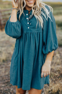 Blue sleeve dress and ribbed velvet bracelet with press pimples and empire waist