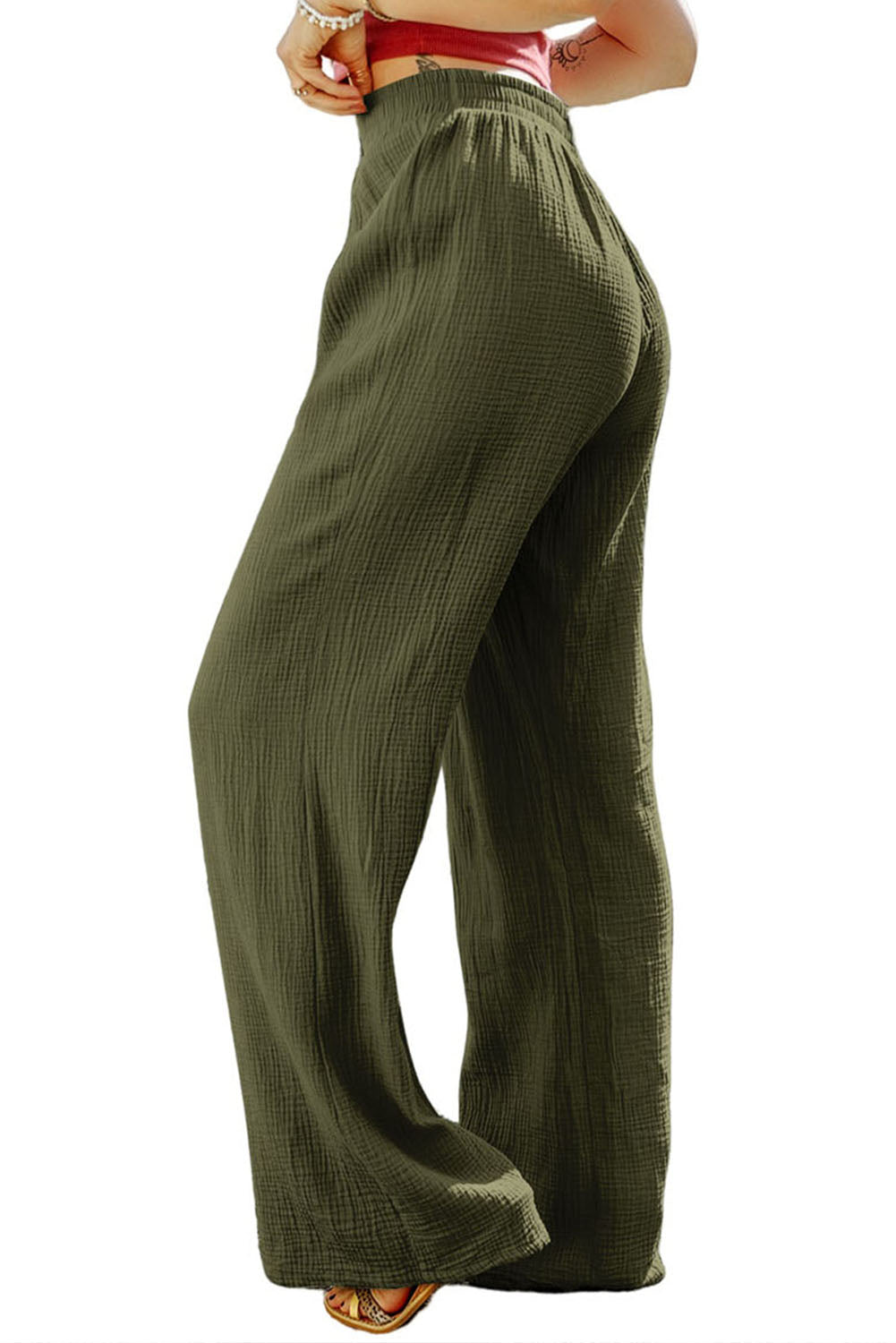 Pantalones anchos con textura arrugada verdes