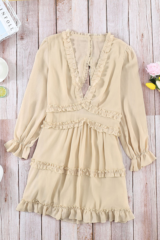 Beige V-neck dress with ruffles and open back