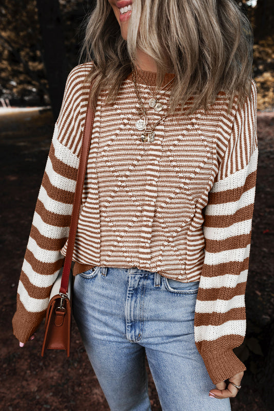 Brown sweater with textured geometric stripes and dropped shoulders