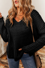 Black V-neck sweater with openwork crochet