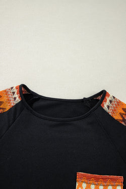 Vestido de mosaico naranja contrastado con raglan y mangas geográficas