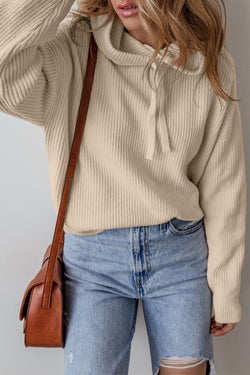 Pull beige à capuche avec cordon de serrage et épaules tombantes de couleur unie