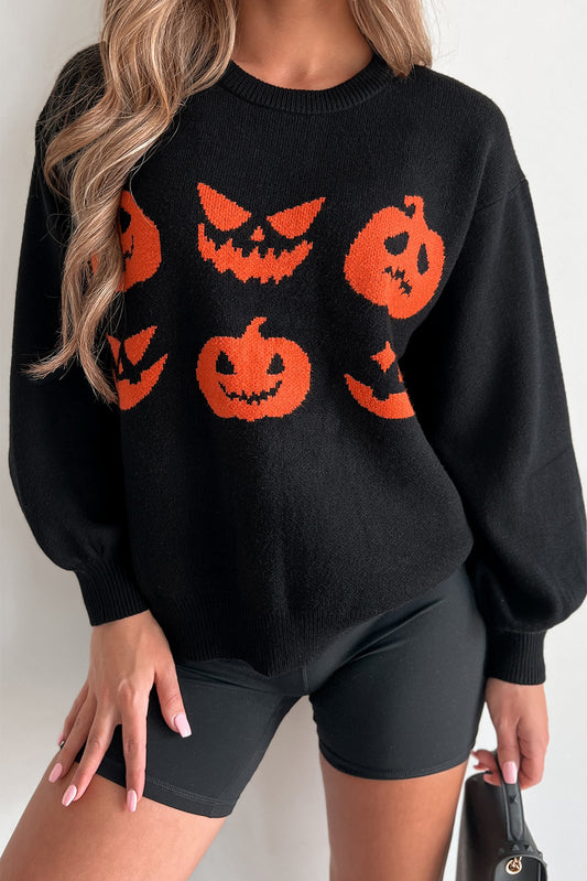 Pull noir à épaules tombantes et motif de visage de citrouille d'Halloween