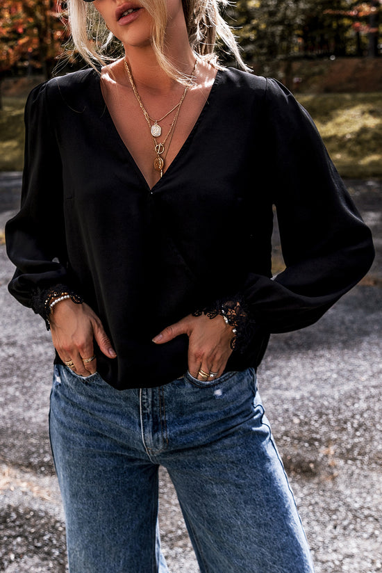 Black V -neck blouse and crochet lace cuffs