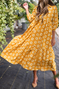 Vestido largo con collar y botones de manga pulsera y flores amarillas estampado