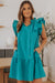 Green mini dress with ruffled sleeves and pockets