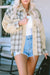 Khaki distressed denim jacket with plaid and patchwork with raw edges